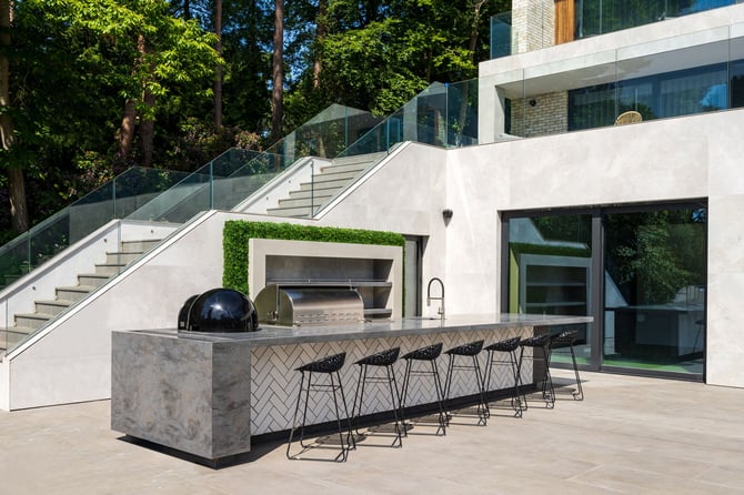 Stylish, contemporary poolside outdoor island kitchen 